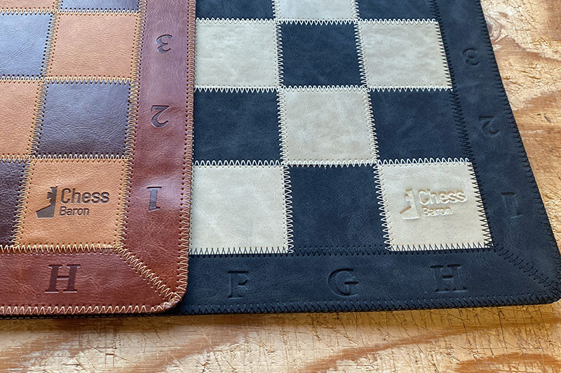 The ChessBaron logos on the leather boards.